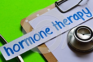 Hormone therapy on Healthcare concept with green background