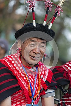 Hornbill Festival.Nagaland,India:1st December 2013 : Senior Naga Tribal Man shares a smile at Hornbill Festival.