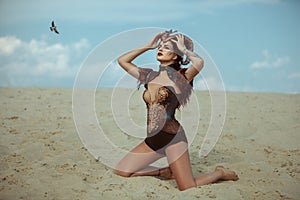 Horned woman in the desert.