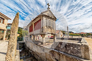 Horreo, Traditional Galician Granary in Fishing village of Combarro. Tourism in Galicia. The most beautiful spots in Spain photo