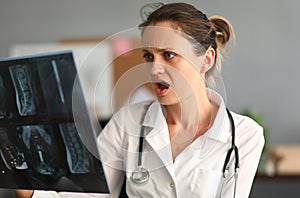 Horrified female doctor