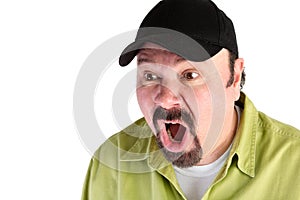 Horrified man in baseball cap shouting