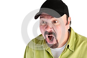Horrified man in baseball cap shouting photo