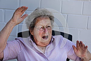 Horrified senior woman photo
