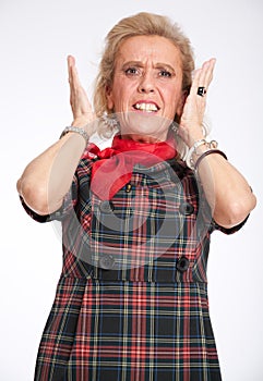 Horrified senior woman