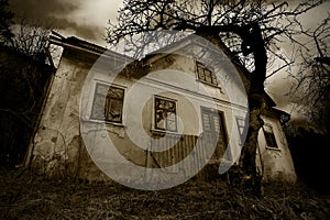 Horror background - the abandoned old creepy house photo