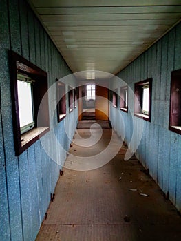 Horror background image, connecting corridor in the factory photo