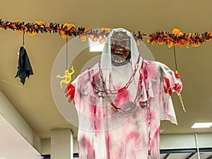 Scary Halloween ornament bloody ghost dummy hanging on ceiling