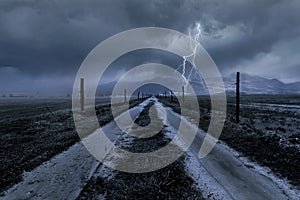 Horror Scene of a Stormy Clouds Over A Country Road