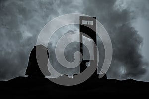 Horror view of Guillotine. Close-up of a guillotine on a dark foggy background