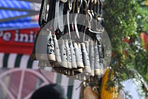 Horse bells hanging during country fair, for sale