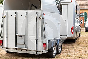 Horse box cargo trailer transport and horse transportation van at farm or ranch. Horsebox carriage lorry animal