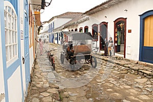 Horse and Buggy ride in the streets of Paraty city photo