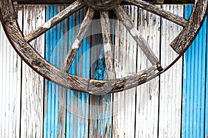 Horse Car Wheel and Wooden Background