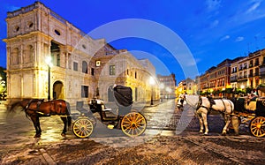 Horse carriages near City hall at Seville