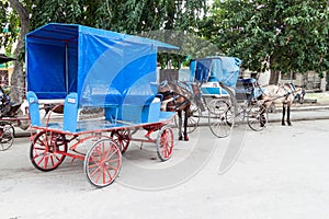 Horse carriages are very common mean of transport in Bayamo, Cu photo