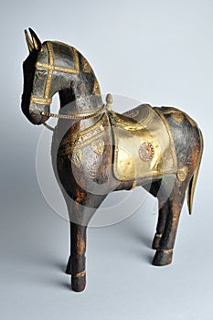 Horse carved with oriental decoration.