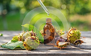 Horse chestnut extract in a bottle. selective focus.