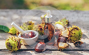 Horse chestnut extract in a bottle. selective focus.