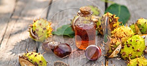 Horse chestnut extract in a bottle. selective focus.