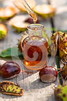 Horse chestnut extract in a bottle. selective focus.