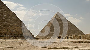 Horse drawn carriage and the pyramid of khafre near cairo, egypt