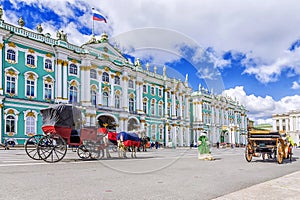 Horse-drawn carriages on the Palace Square in St. Petersburg