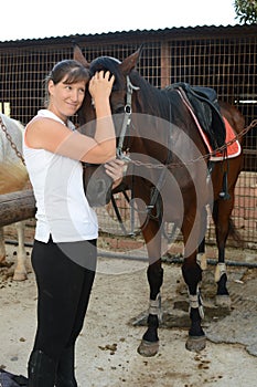 Horse and girl close. Friendship, lovely.