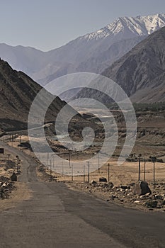 Indus river flowing through mountains in Ladakh, India photo