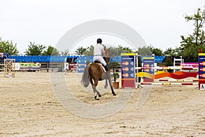 Horse jump at the equitation contest photo