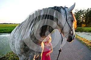 Horse and a little girl