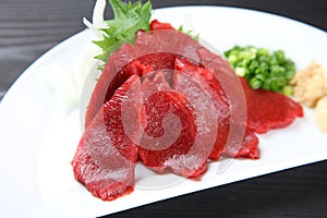Horse meat sashimi with green onion