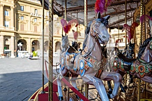 A horse on a merry-go-round in Florence