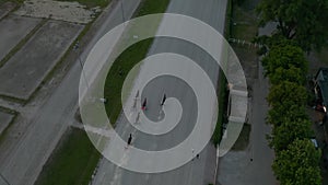 Horse Race with Harness Racers on dirt track, Aerial Birds Eye Overhead Top Down View