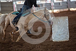 Horse And Rider Barrel Racing At A Rodeo