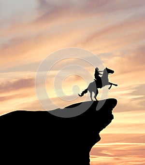 Horse Rider on Cliff Silhouette