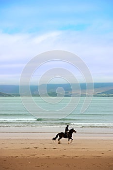 Horse and rider at the maharees