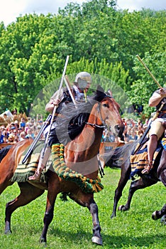 Horse riders on the battle field.