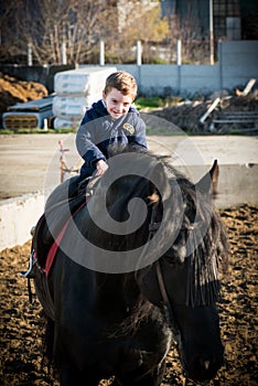 Horse riding - little boy