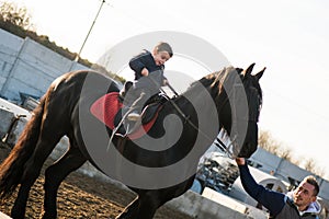 Horse riding - little boy