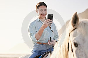 Horse riding, phone and woman on beach with pet for travel using social media, website and web for chatting. Texting