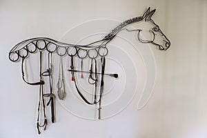 Horse shape decoration made by bridle