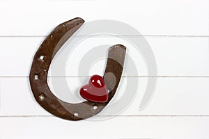 Horse shoe with heart symbol