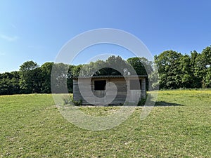 Horse stables, in an open field on, Moor Top, Dewsbury, UK