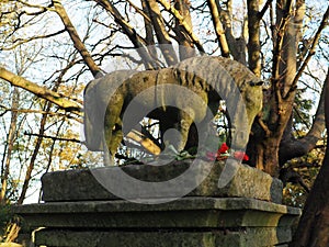 Horse statue on a grave on Highgate Cemetery, North London, England