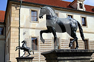 Horse statues and building of the Senate of Czech Republic in Prague. Waldstein palace garden.