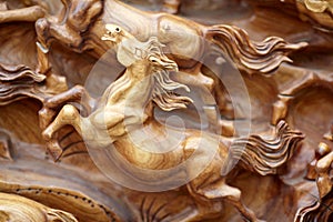 Horse wood carve photo