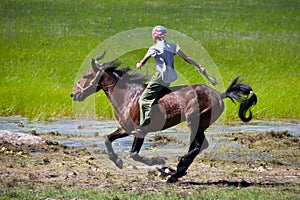 On horseback across the steppe photo