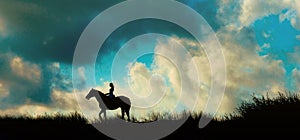 Horseback rider over blue sky on a mount