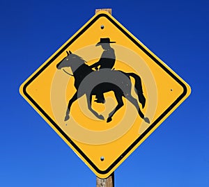 Horseback rider road sign